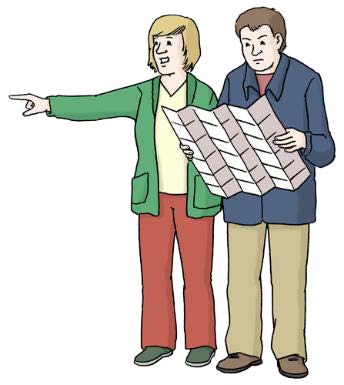 Zwei Menschen mit Stadtplan Zwei Menschen mit Stadtplan